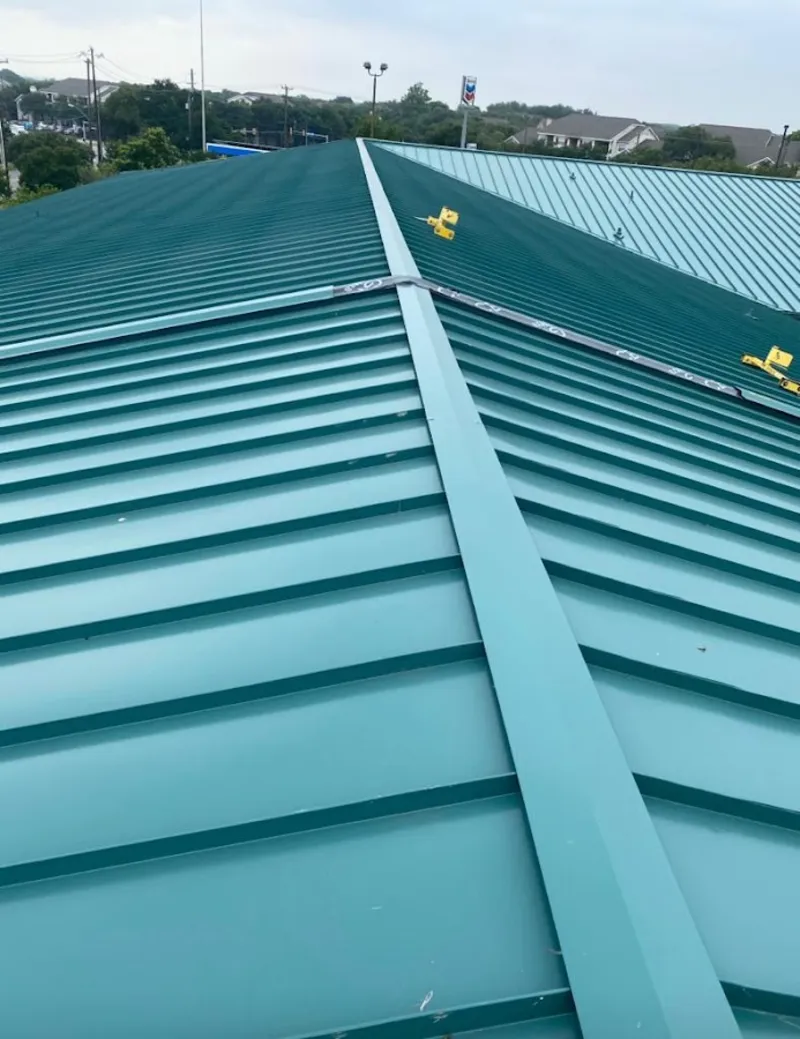 Green commercial metal roof ridge and valley for Metal Roof Repair in Clewiston