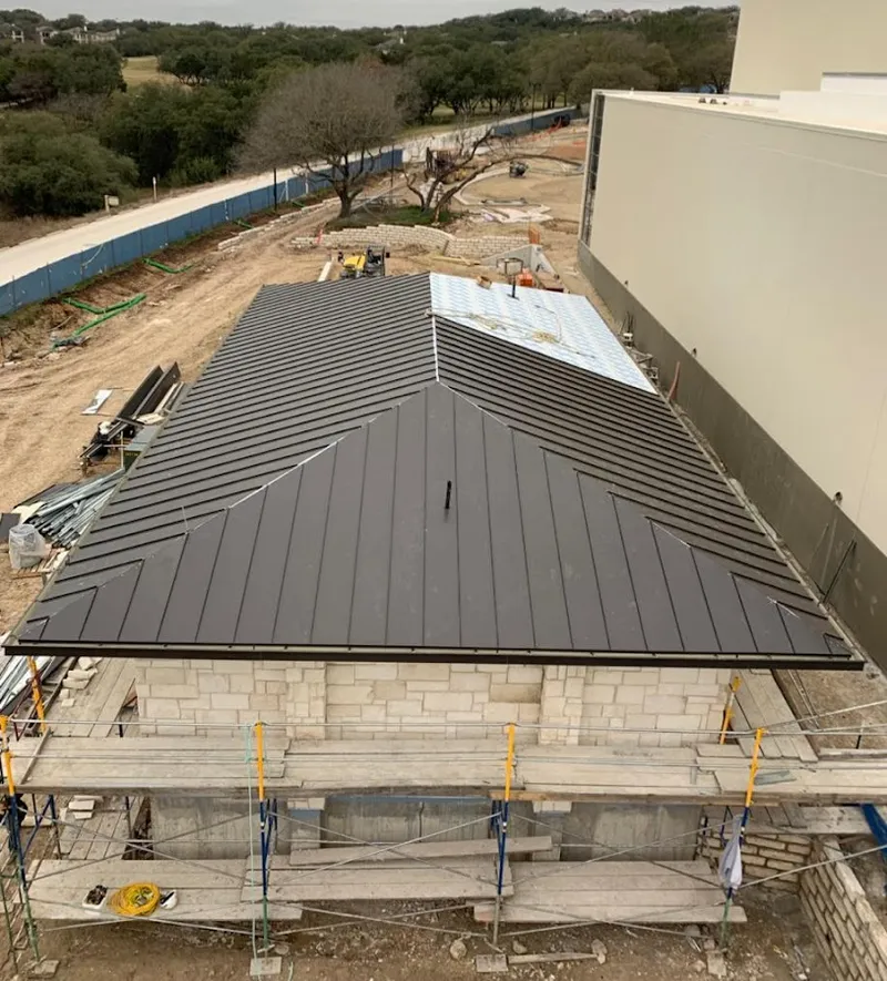 Metal roof new construction with scaffolding in Clewiston